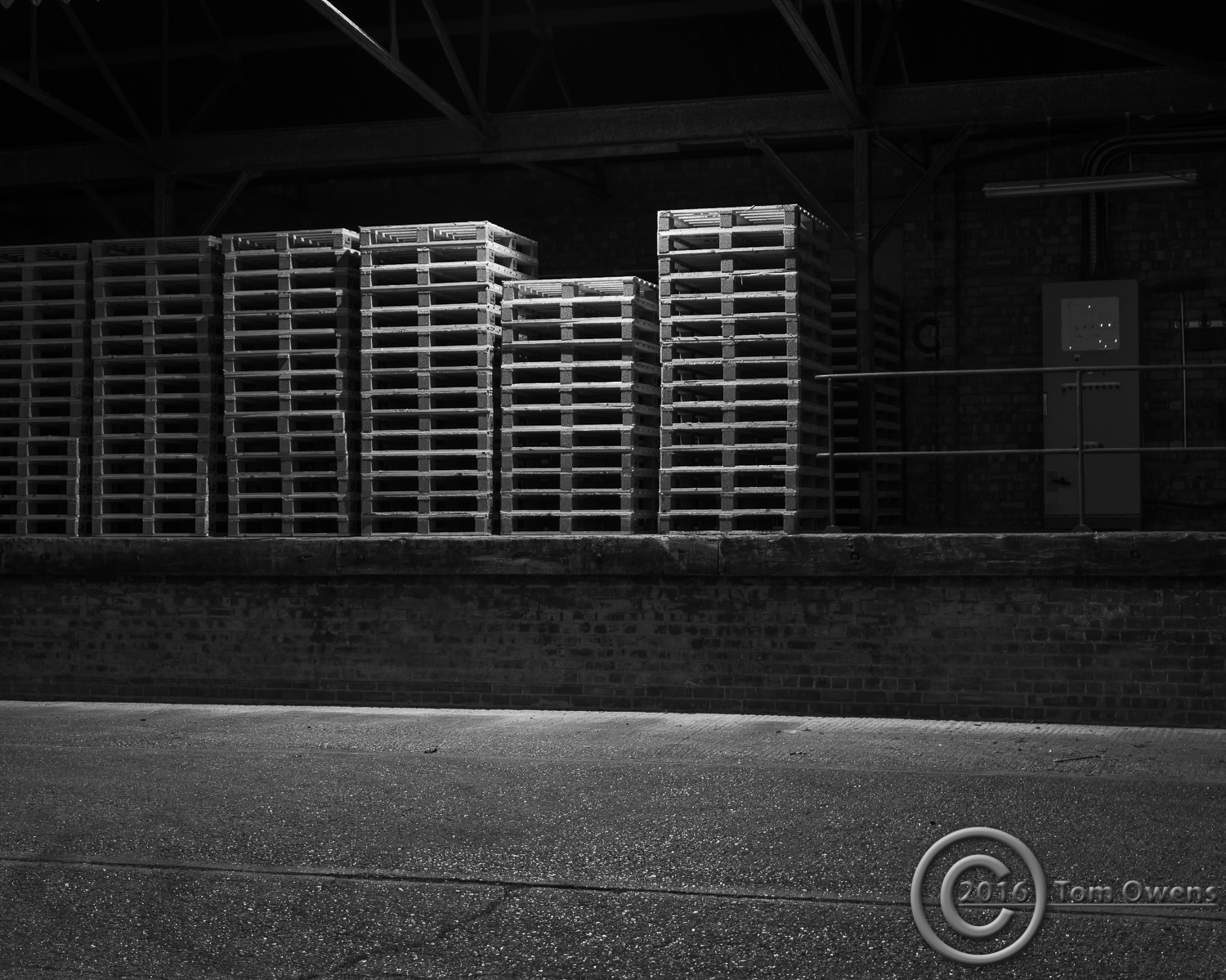 Stacked pallets on loading bay