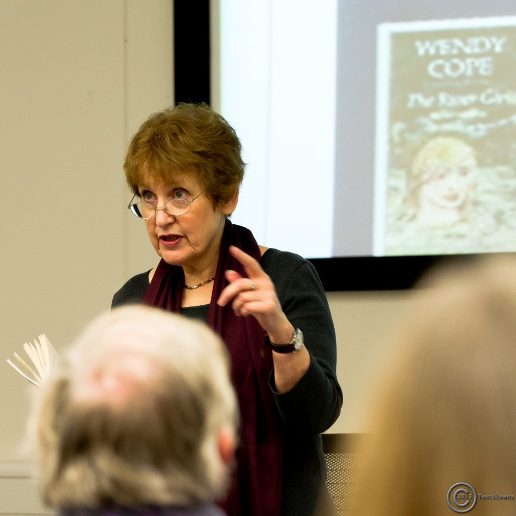 Wendy Cope OBE reading to her audience at UCS