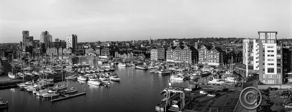High viewpoint of Ipswich Wet Dock and town ahowing vessels and buildings in Black and White